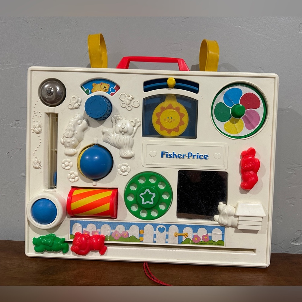 A vintage Fisher-Price Activity Center "Busy Box" from 1980s